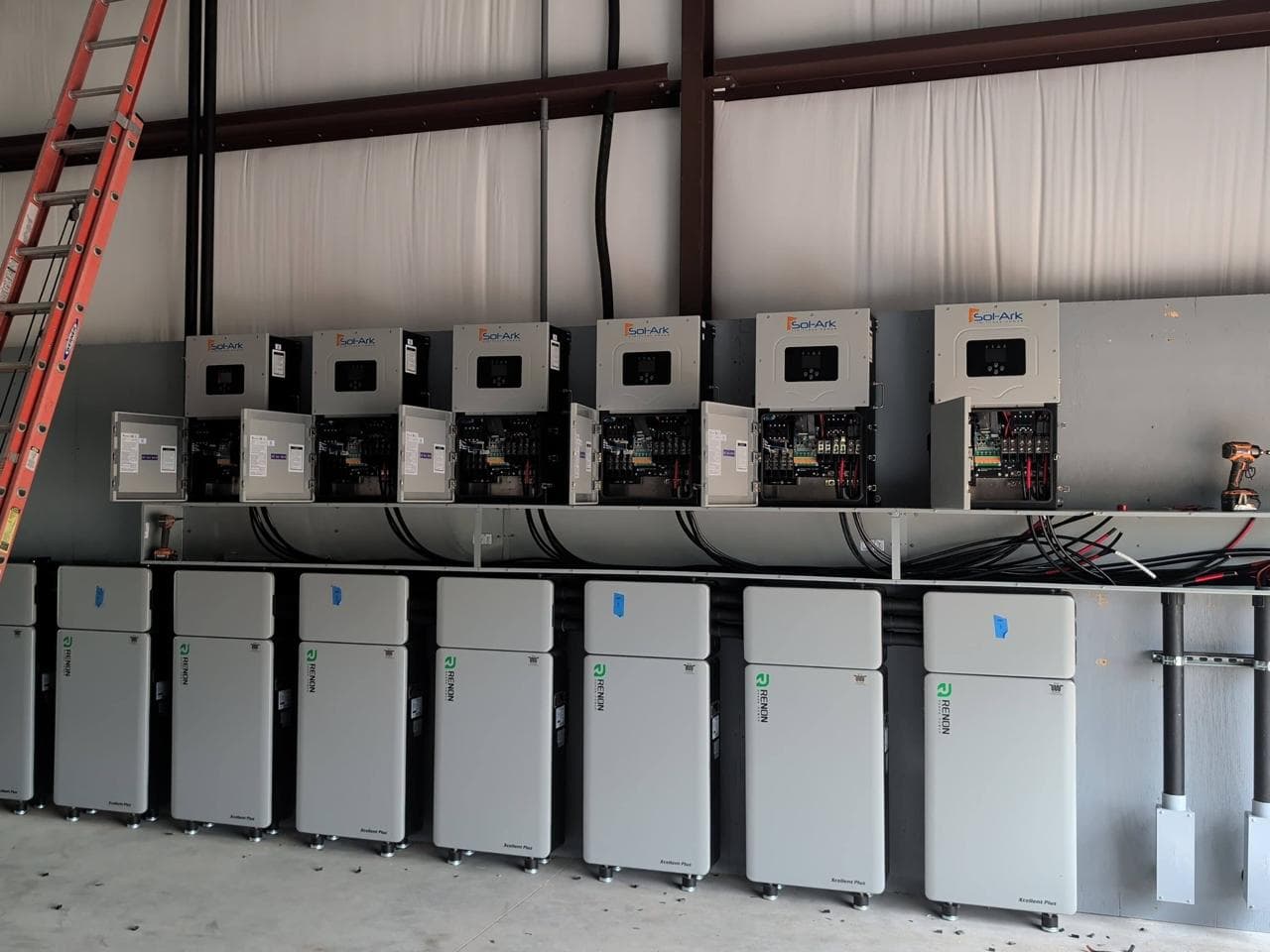 Six Sol-Ark 15k inverters paired with Renon EcoHome Plus battery wall — Texas ranch install
